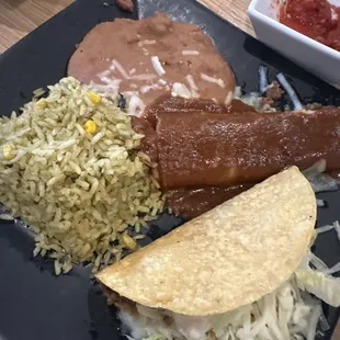 Taco, enchiladas rice and beans