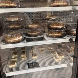 a display of cakes