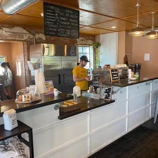 a man standing at the counter