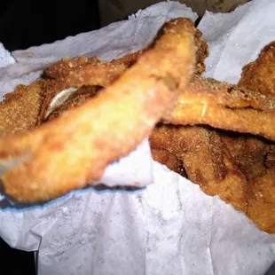 Onion rings taste like old oil, &amp; bit overdone.