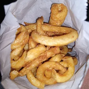 "Cajun" fries..huh? They're just badly done curly fries from a bag, not seasoned.