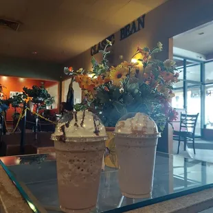 two cups of coffee on a table
