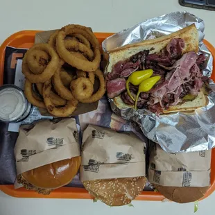 Pastrami, onion rings, and 3 burgers (spicy chicken, burger, mini burger)