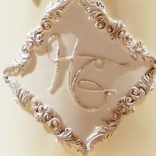 a wedding cake with a monogram