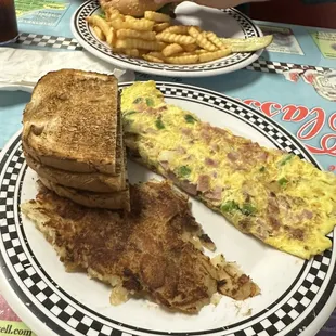 Western Omelet with cheese , sourdough toast and home fries