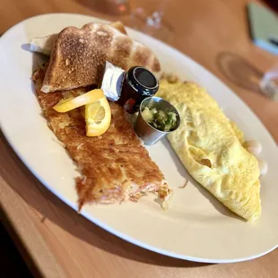 Seafood Omelet Breakfast with hashbrowns and sourdough toast.