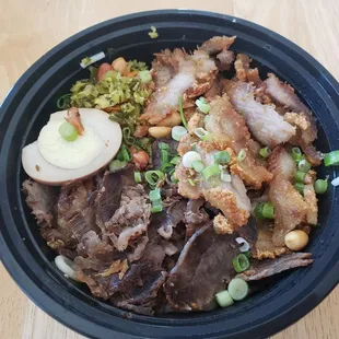 Crispy pork and marinated beef size large! New added flavor to the dish!