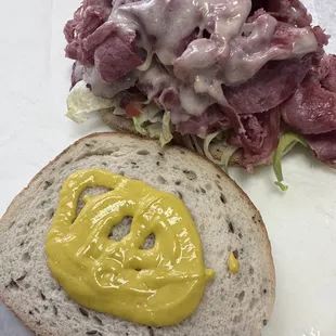 Corned beef sandwich customized with lettuce