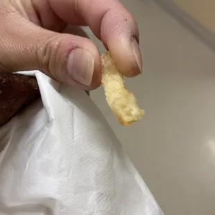 Very dried up fries like it had been cooked for several days ago