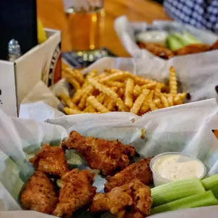 Six Asian dry rub wings, regular fries, and Carolina dry rub wings.