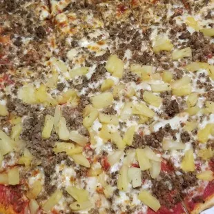 Sausage pizza with half pineapple- my kids&apos; favorite!