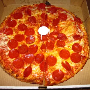 a pepperoni pizza in a box