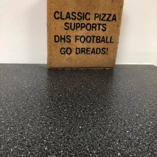 a box of pizza on a table