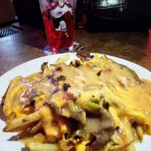 Cheesy Fries with Philly Meat and Pork green chili