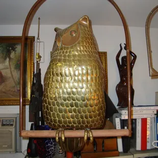 A huge Sergio Bustamante owl sculpture .