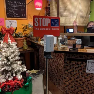 Decorated for Christmas. That&apos;s the owner waving.