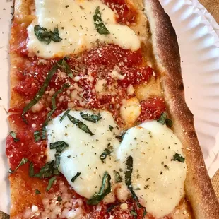 Two slices of Summer here. Best when eaten there. Crispy crust!!