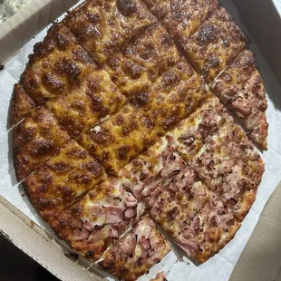 large 14 inch pizza   half ham, light tomatoe  sauce
