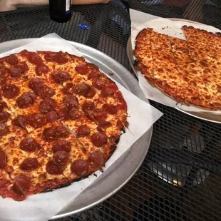 Pepperoni and cheese pizzas