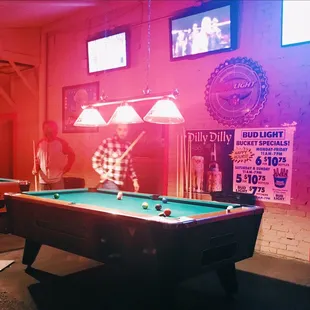 They have 2 pool tables in the back!