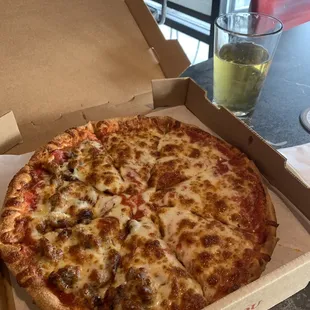 Pizza from Gioninos (attached)  and a beer from classics.