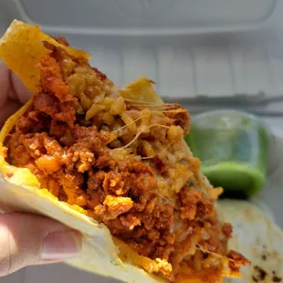 Inside the burrito.  Packed with chorizo rice beans and cheese. So good.