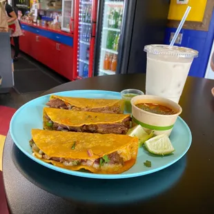 Taco Birria y horchata.  Looks yummmmoooooz!!