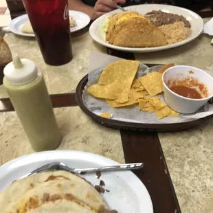 Crispy taco plate and bean and cheese taco , carne asada taco