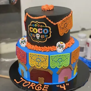 a cake decorated with sugar skulls