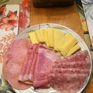 Bierschinken, schweinbauch and vinegar souse served with Irish cheddar.
