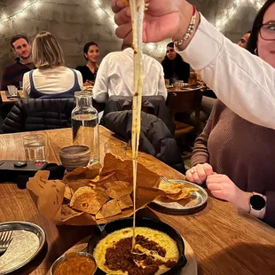 a woman eating a meal at a restaurant