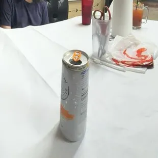 Our seating in a booth. Note the bib and paper table cover.