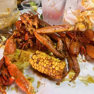 crab, corn, and corn on the cob