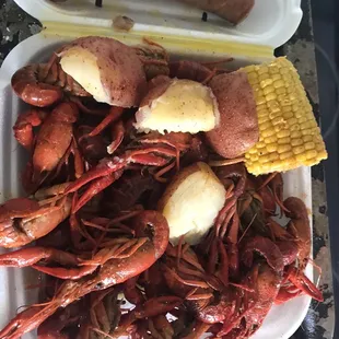 Mild Crawfish Platter with Potatoes and Corn and I got Two Sausage links as well.