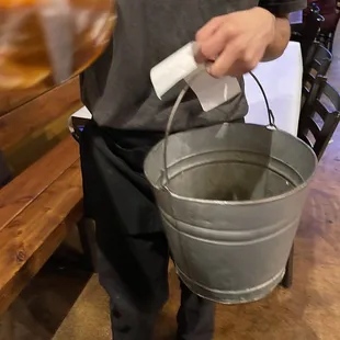 They bring your bags in a bucket