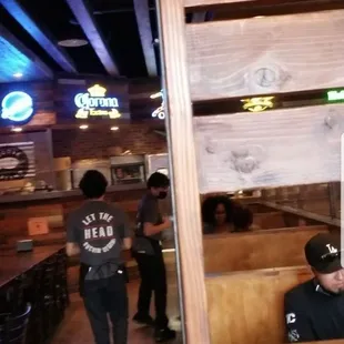 Empty long table on the left &amp; more empty booths
