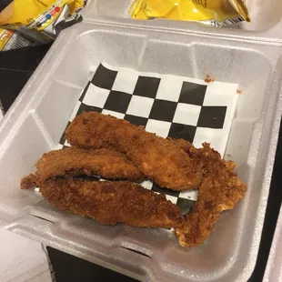 chicken strips in a plastic container