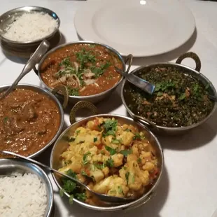 Lamb Madras, Lamb Rogan Josh, Chicken Saag Wala and Aloo Gobi w/o potatoes.  Yum!