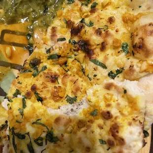 Their so called garlic naan but it looks like daal rubbed on top of it.