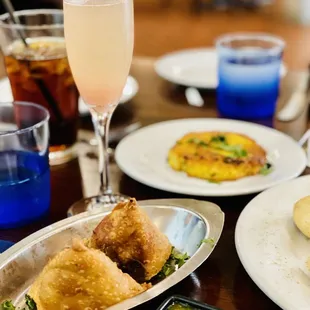 Samosas and guava mimosa