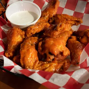 a basket of chicken wings