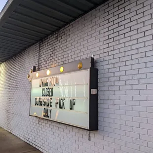 a sign on the side of a building