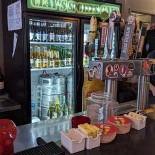 a bar with beer and snacks