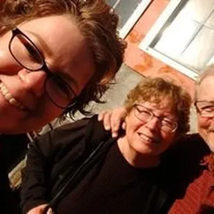 a woman and two older men