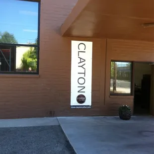 the entrance to clayton coffee and tea