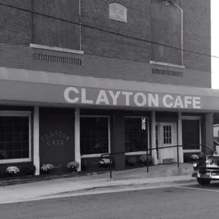 a car parked in front of the restaurant