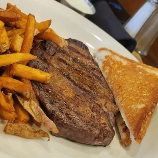 steak and french fries on a plate