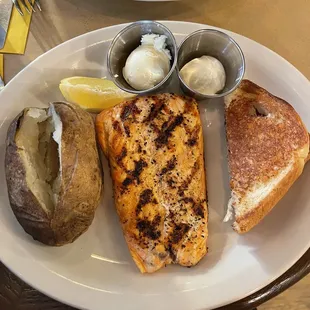 8oz chargrilled salmon, Texas toast, baked potato with butter and sour cream on the side.