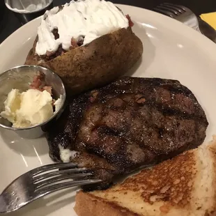 8oz ribeye comes with one side and salad bar and Texas toast