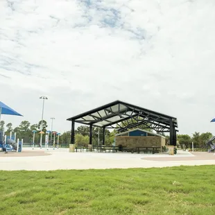 The playgrounds and splash pad are all surrounding the bathrooms and large pavilion.